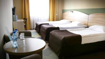 Фото номера Стандартный трехместный номер Отель Hotel Texas - Żory г. Жоры 4